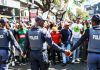 Thousands of anti-migrant protesters march in South Africa amid heavy police presence