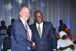 Here's a polished caption suitable for publication: The Acting Chargé d’Affaires of the U.S. Embassy in Ghana, Rolf Olson, and the Member of Parliament for the Damongo Constituency and Ranking Member of Parliament's Select Committee on Foreign Affairs, Samuel Abu Jinapor, pose for a photograph during the celebration of the 250th Independence Day of the United States of America in Accra.