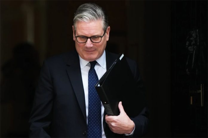 Britain’s Prime Minister Keir Starmer leaves 10 Downing Street in London, Monday, April 20, 2026 to face a showdown in Parliament over the appointment of Peter Mandelson as ambassador to Washington. (AP Photo/Alastair Grant, File)