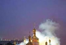 Russian strikes kill 11 and set historic cathedral in Kyiv ablaze