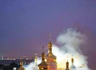 Russian strikes kill 11 and set historic cathedral in Kyiv ablaze