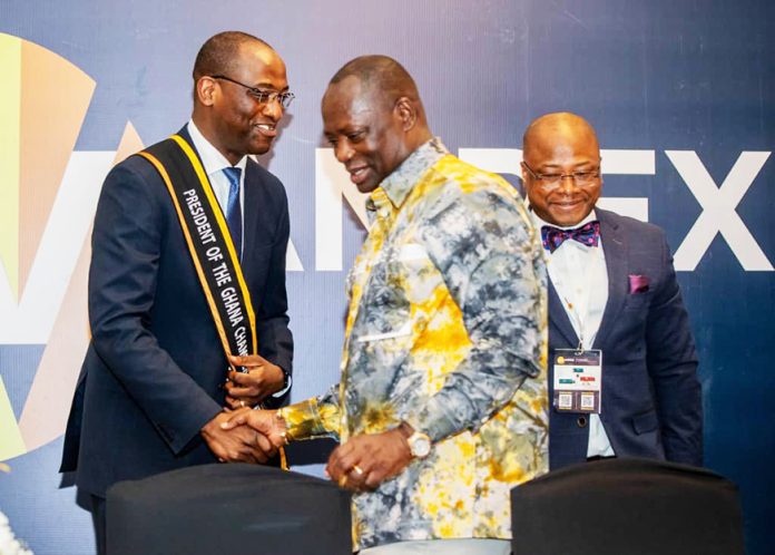 Minister of Lands and Natural Resources, Emmanuel Armah-Kofi Buah exchanging handshake with the President of Ghana Chamber of Mines, Ing. Frederick Attakumah, President at the 98th Annual General Meeting of the Ghana Chamber of Mines