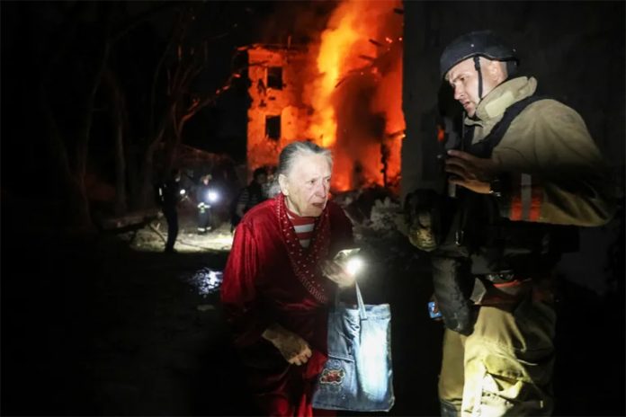 A rescue worker at the apartment building hit by a Russian air strike
