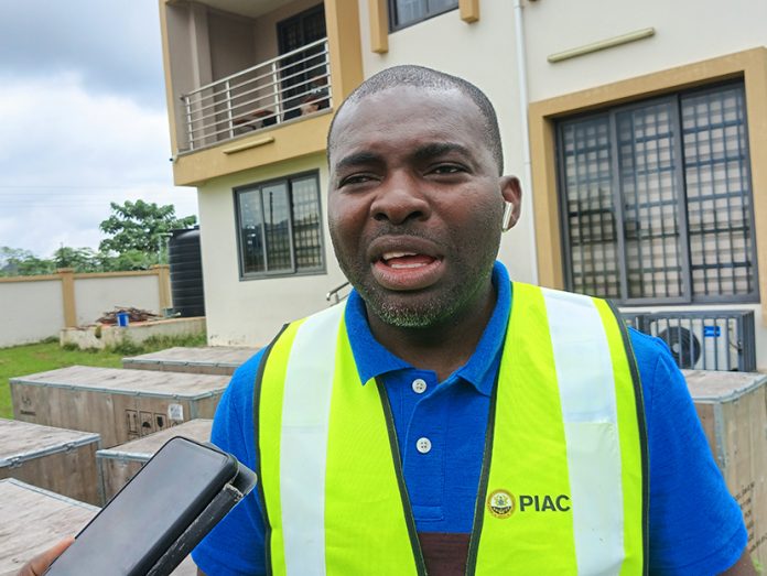 Christopher Opoku Nyarko, a Member of PIAC speaking to the media