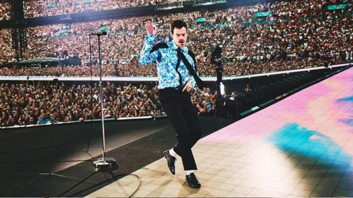 Harry Styles performing at Wembley