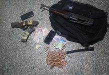 Police Retrieve GH¢140,000, AK-47 Rifle After Robbery Attack at Lashibi Ammunitions and other exhibits retrieved by police from the deceased suspect following the foiled robbery attack at Lashibi.