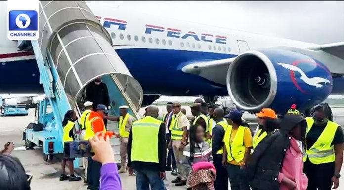 South Africa returnees alighting from the Air Peace flight that brought them home