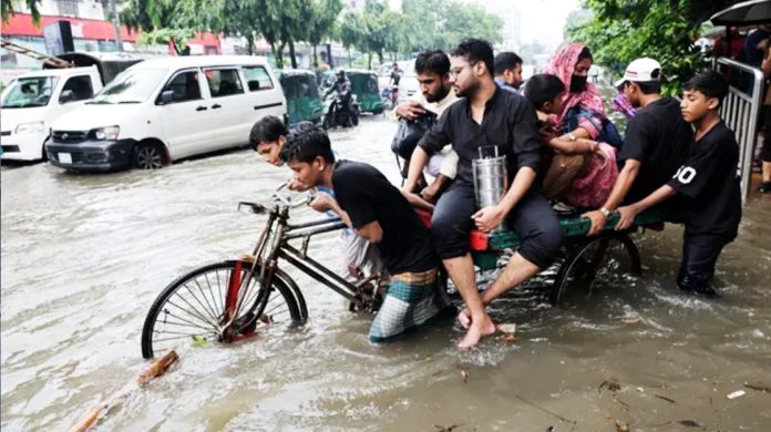The water has reached knee level in some parts of Dhaka