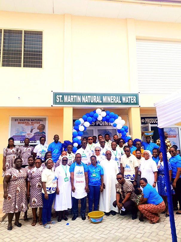 Group photograph of management, staff, health professionals and other stakeholders after the launch of Saint Martin's Natural Mineral Water at Agomanya.