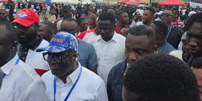 Newly elected Ashanti Regional NPP Chairman, Odeneho Kwaku Appiah, in a blue cap, celebrating his victory after the election.