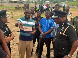 Police officers at the scene gathering vital information to aid further investigations.