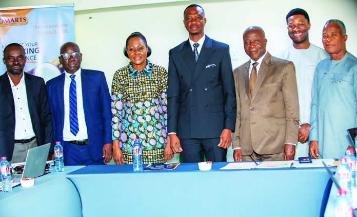 The Board of Directors in a photograph with Judge Fumey (middle)