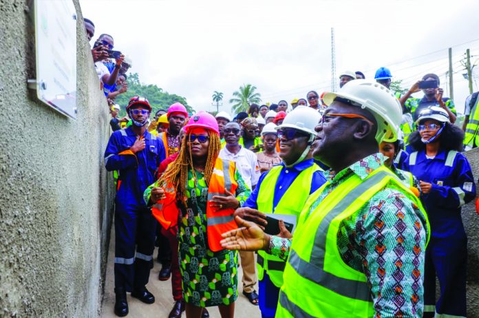 UMaT VC, Joseph Frimpong, Mine Inspector, Minerals Commission and Pro-VC Mrs. Grace Ofori-Sarpong Akuffo admire the unveiled mine model