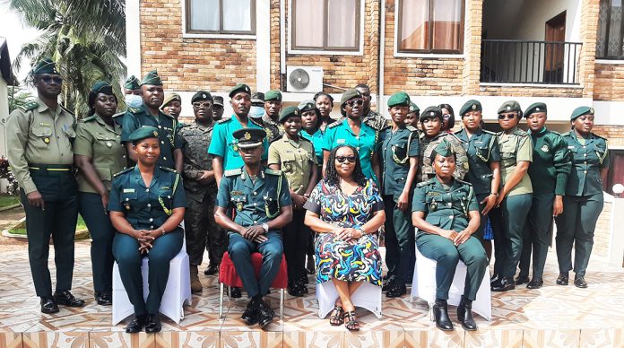 DCOI Fred Amankwa poses with participants