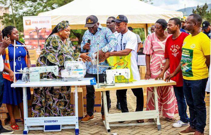 MCE, Addae Boateng and stakeholders admiring the machines