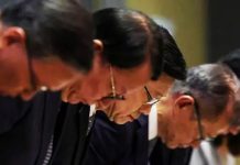 Hong Kong’s leader apologises for deadly high-rise fire