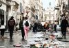 Burnt out cars and shattered glass on Paris streets after protests turn to riots and looting