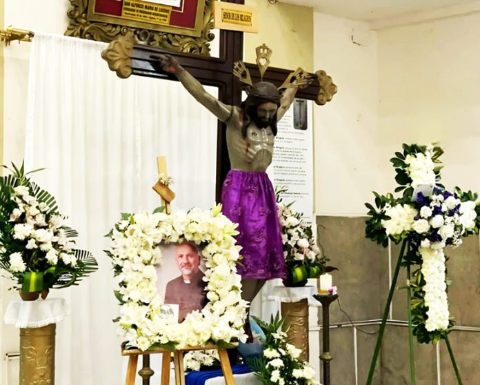 Priest killed by falling crucifix